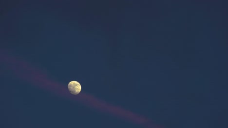 Pink-Ribbon-Cloud-Floating-by-Waxing-Gibbous-Moon-at-Dusk