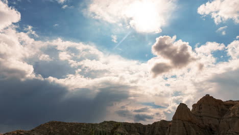 Time-Lapse-Storm-Clouds-Cover-the-Sun-Beams-in-the-Redrock-Canyon