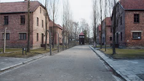 Inside-main-gate-area-of-Auschwitz-concentration-camp-barbed-wire-electric-fencing