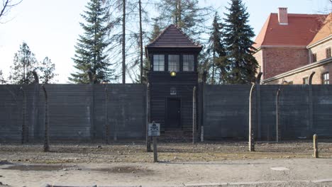 Iconic-Auschwitz-museum-guard-watch-tower-entrance-tourist-attraction-building