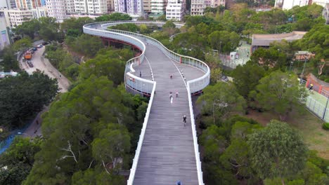 Cyclists-at-Hong-Kong-Po-Kong-elevated-cycling-track-park,-Aerial-view