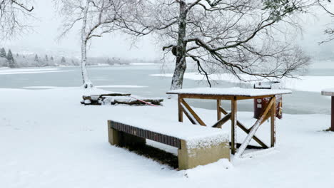Bench-and-table-fully-snowed-down