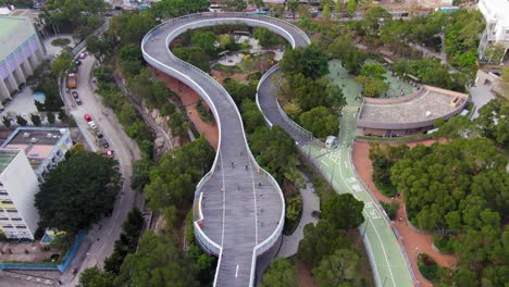 Po-Kong-Village-Road-Park-Elevated-Cycling-Track-and-Skatepark-in-downtown-Hong-Kong,-High-altitude-aerial-footage