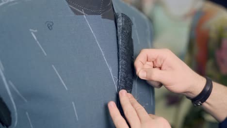 the-tailor-kills-the-collar-of-his-jacket-for-tailoring