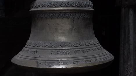 A-bell-at-a-local-Hindu-temple-in-the-city-of-Kathmandu,-Nepal