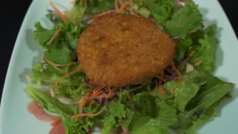 Breaded-Chicken-Placed-On-Salad