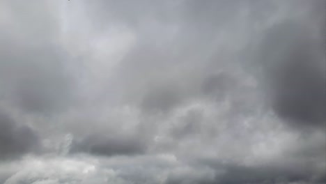 Mid-afternoon-thunderstorm-rain-clouds-forming-and-blending-across-the-african-horizon-time-lapse,-noise-free-4k-footage