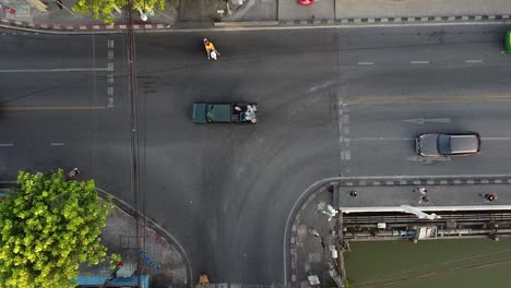 AERIAL-DIRECTLY-ABOVE-A-Busy-Asian-Road-T-Intersection
