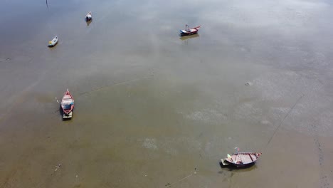 AERIAL,-Boats-Left-Abandoned-During-Low-Tide