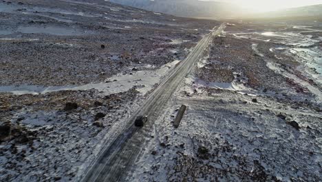 A-trip-through-the-snowy-white-landscape-of-Phantom-Island,-Iceland---aerial