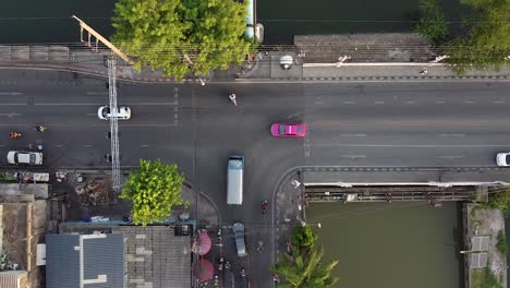 AERIAL-DIRECTLY-ABOVE-A-Chaotic-Asian-Road-Intersection