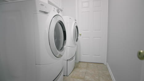 Gimbal-shot-of-a-laundry-room-in-a-suburban-home