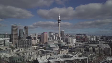 drone-rising-showing-CBD-Auckland-and-skycity-on-a-sunny-day