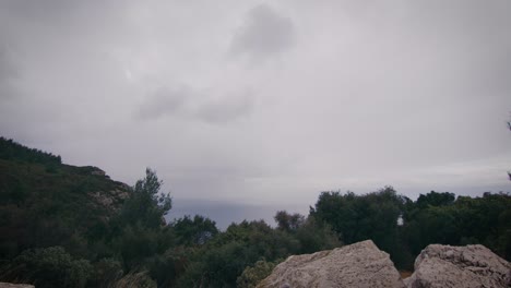 Stormy-clouds-and-wind-over-mediterranean-coastal-landscape-time-lapse