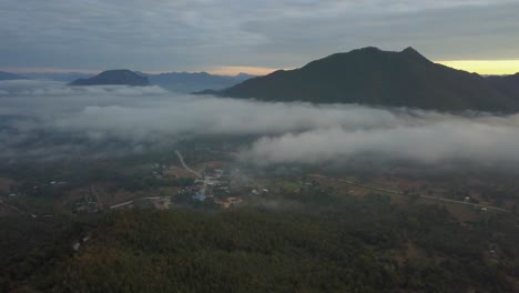 Beautiful-Mountain-And-Forest-Landscape-In-Thailand-On-A-Gloomy-Day---aerial-shot