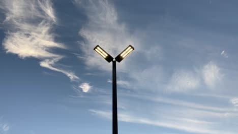 road-lamp-in-the-car-park-with-beautiful-cloud-in-the-afternoon-on-a-sunny-day