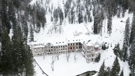 Aerial,-abandoned-Grand-Hotel-Wildbad-and-thermal-baths-in-San-Candido-Italy