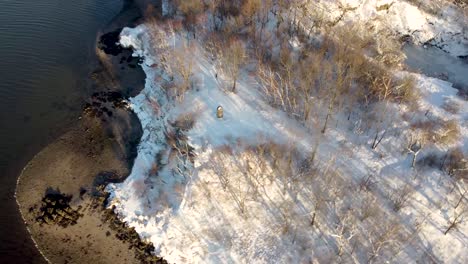 Winter-snowy-scene-of-Squantum-wetlands-waterfront,-Massachusetts
