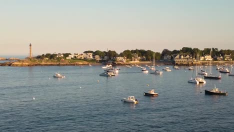 Marblehead-Neck-full-of-yachts-with-the-light-and-United-States-Flag