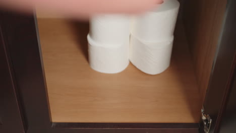Man-stockpiles-toilet-paper,-white-American-hoarding-toilet-tissue,-Toilet-paper-stash,-Man-hides-toilet-paper-in-preparation-for-Coronavirus-COVID-19