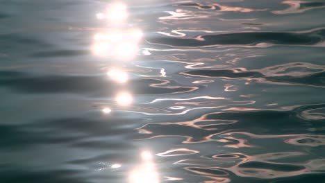 Ripples-and-sun-glare-on-the-waves-water