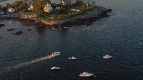 Yachts-anchored-and-sailing-near-a-rocky-shore-in-Marblehead-Peninsula