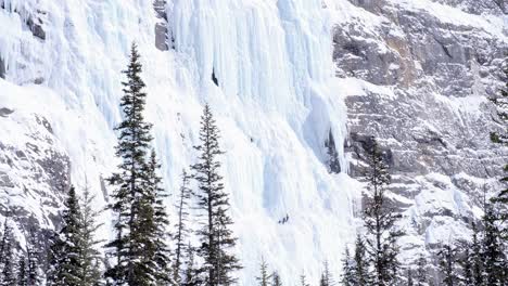 Ice-climber-leads-pitch-two-of-steep-route-on-sunny-Weeping-Wall