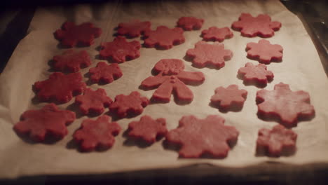 Cookies-baking-and-rising-inside-oven,-sponging-and-fluffing-up-timelapse
