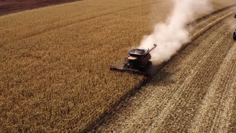 Beautiful-drone-shot-of-combine-harvesting-corn-in-Texas
