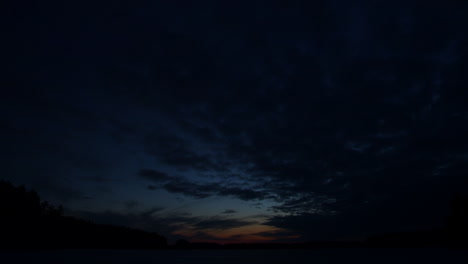 Timelapse-of-crescent-moon-and-venus-by-golden-hour-on-icy-lake