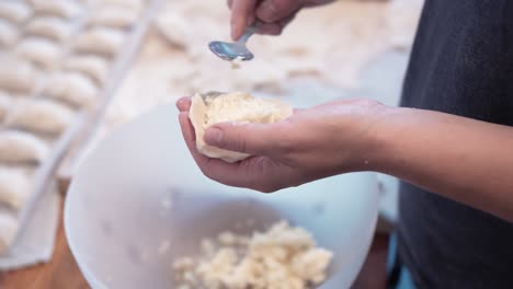 Woman-making-dumplings-at-home