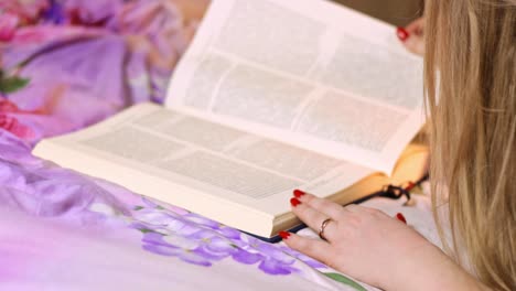 Christian-faith-lady-reading-a-Bible-with-focus,-closeup