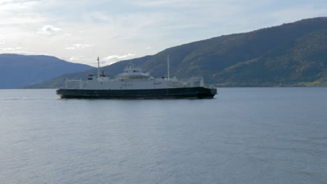 A-Ferry-Travels-through-a-Fjord-on-a-Sunny-Summer-Day-in-Norway