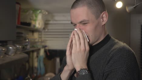 Allergy-Man-Blowing-His-Nose-In-Tissue-Paper---Medium-Shot