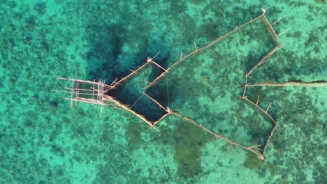 Bird’s-Eye-view-of-fish-cage-on-crystal-clear-sea-water