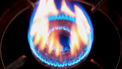 Firing-the-gas-burner-with-a-lighter,-Close-up