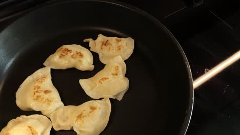 Dumplings-on-pan,-traditional-food-homemade