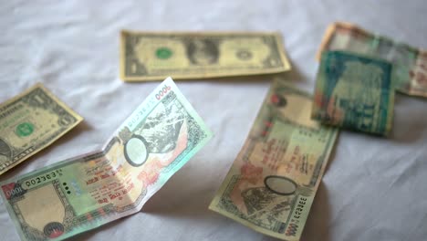 Dollars,-Yuan,-Riyal,-Nepali-Rupees