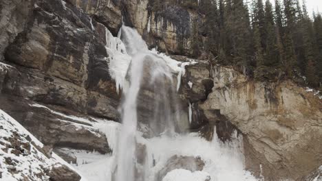 Panther-Falls-Flowing-On-The-Nigel-Creek-In-The-Canadian-Rockies,-British-Columbia,-Canada-During-Winter