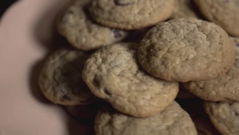 Delicious-Cookies-In-A-Plate-Rotating-On-The-Table---Close-Up-Shot