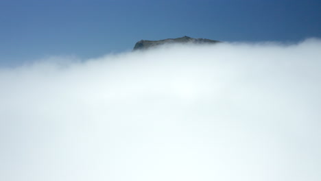 Aerial:-Judas-Peak-revealing-from-the-clouds