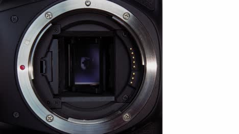 Shutter-mechanism-inside-of-an-open-digital-camera-body-without-the-lens