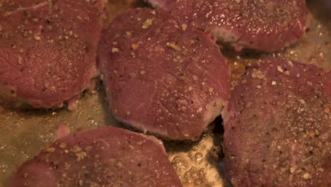 Beef-steaks-of-delicious-juicy-meat-steaks-cooking-in-frying-pan