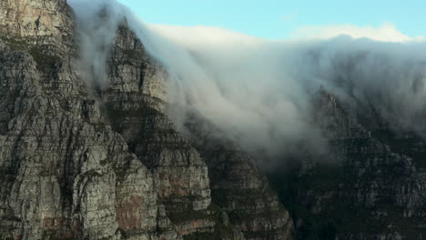 Aerial:-Clouds-falling-Table-Mountain-in-Cape-Town