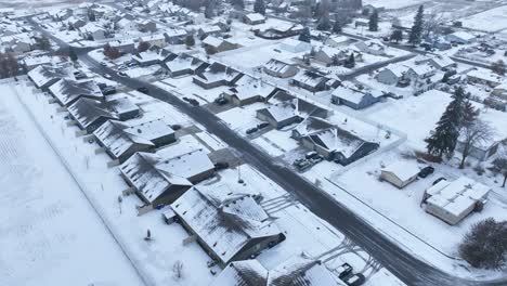 Aerial-view-of-snow-covering-a-rural-neighborhood-in-Spokane,-Washington