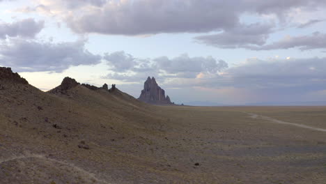 Shiprock-New-Mexico-Sunset-and-Storm-in-Background-in-4k