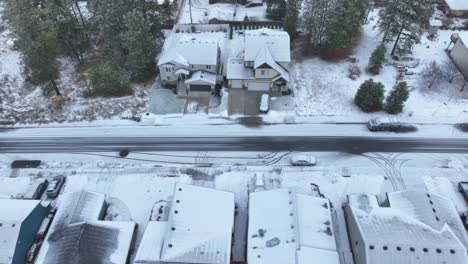 Side-scrolling-aerial-view-of-snow-filled-streets