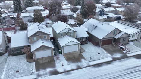 Aerial-view-of-single-family-houses-with-a-fresh-sheet-of-snow-on-them