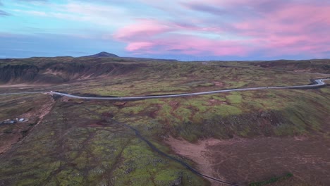 Route-1-Passing-Through-Hellisheidi-Power-Station-During-Pink-Sunrise-In-South-Iceland