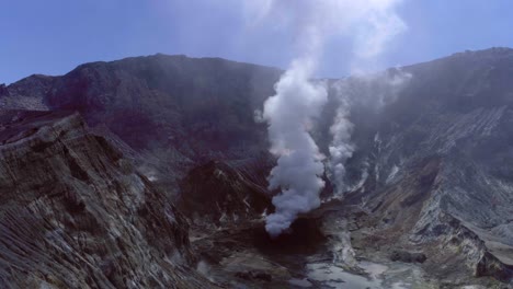 Whakaari-White-Island-crater-with-smoke-plume,-active-volcano,-aerial